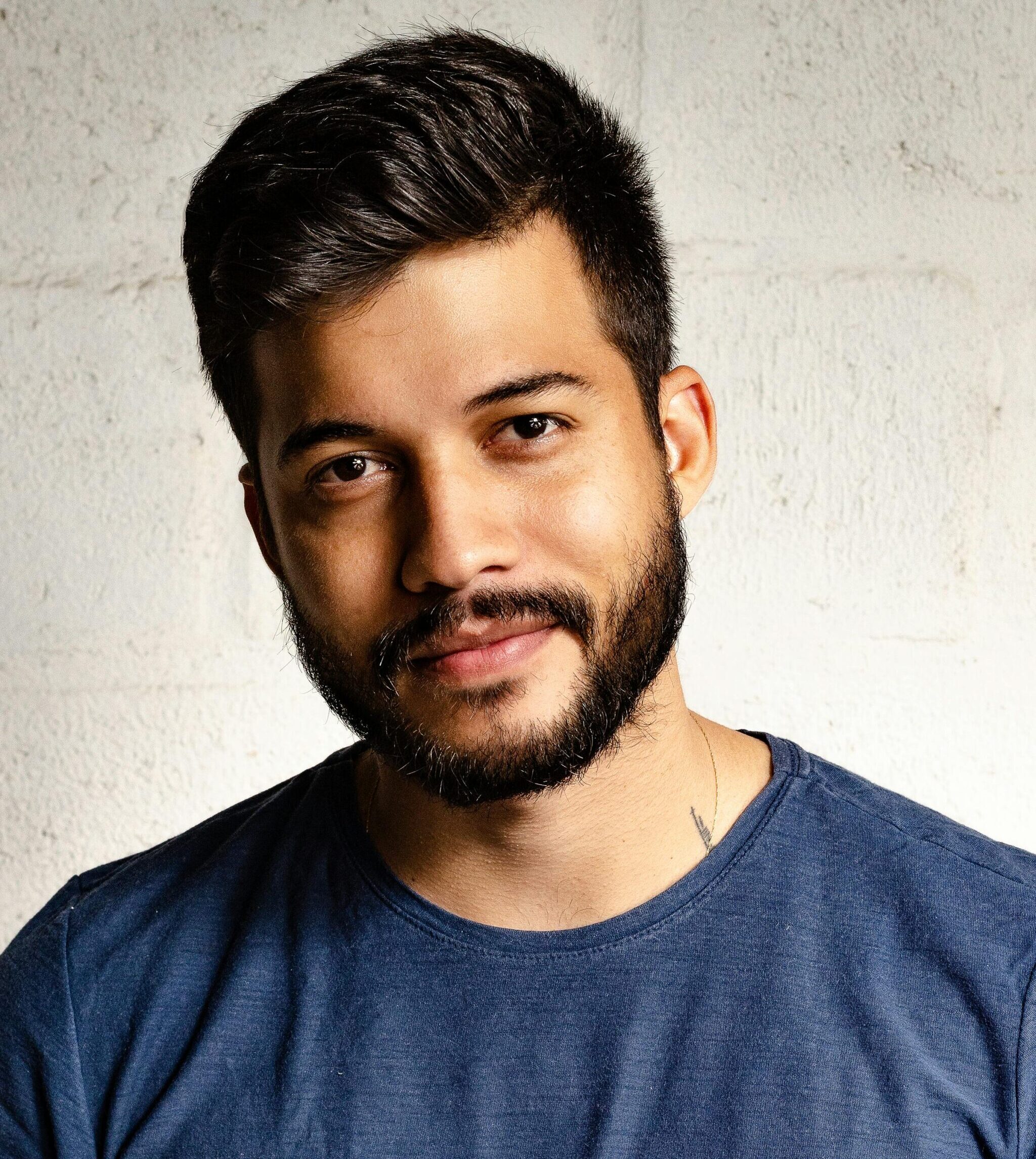 Man Wearing Blue Crew Neck T-shirt