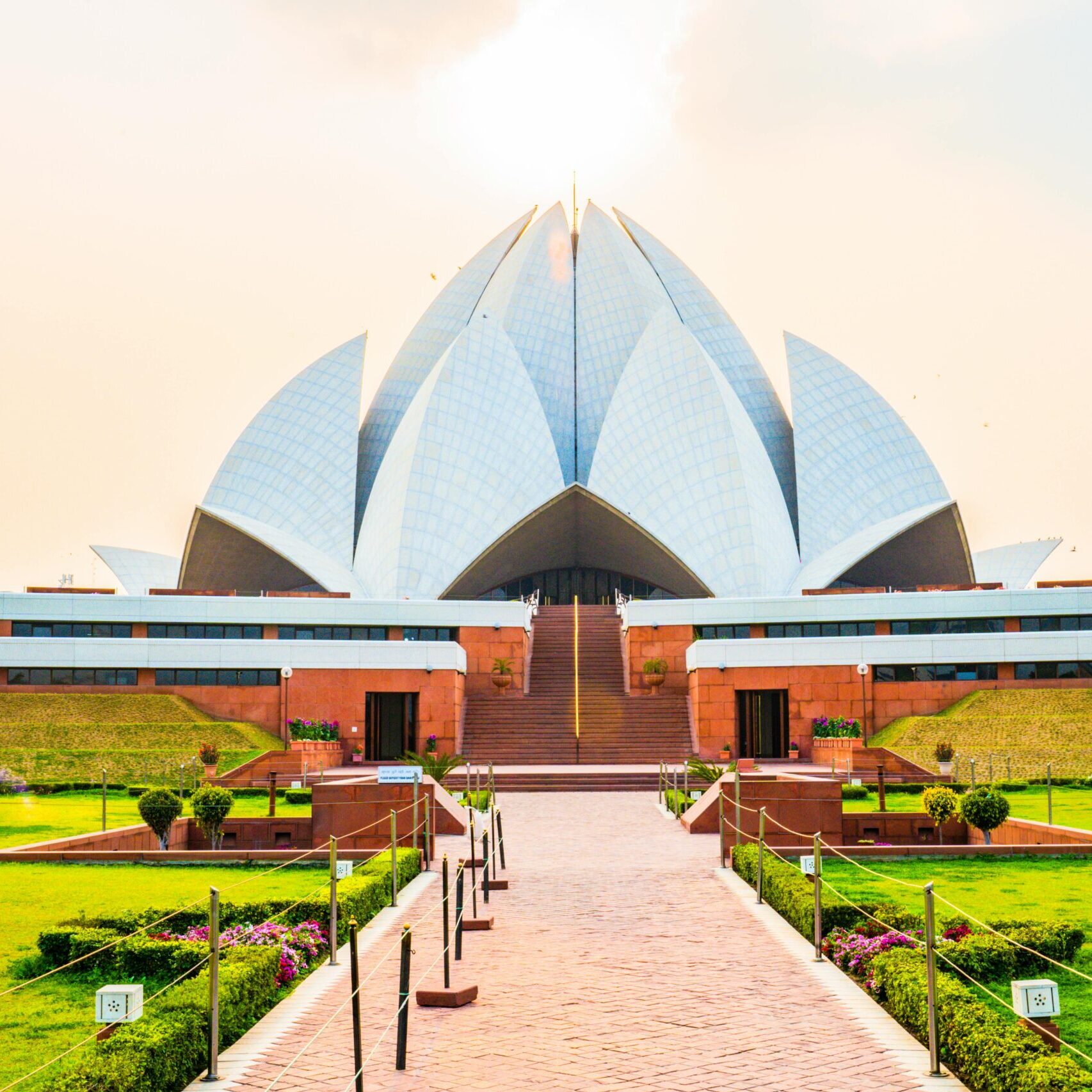 White Dome Building Near Green Grass Field